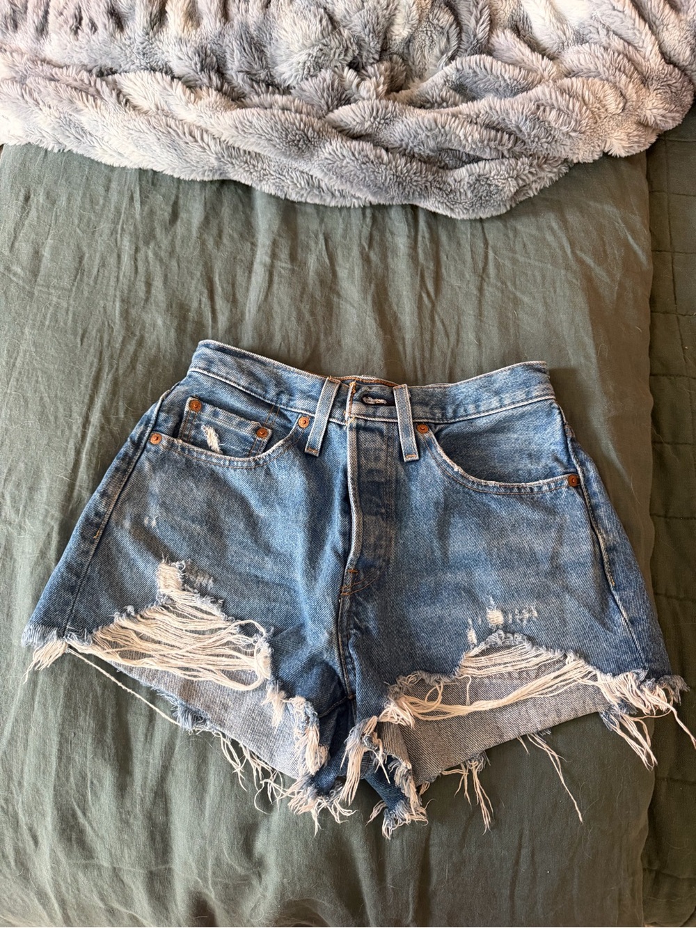 Levi's Distressed Light Blue Denim Cutoff Shorts
